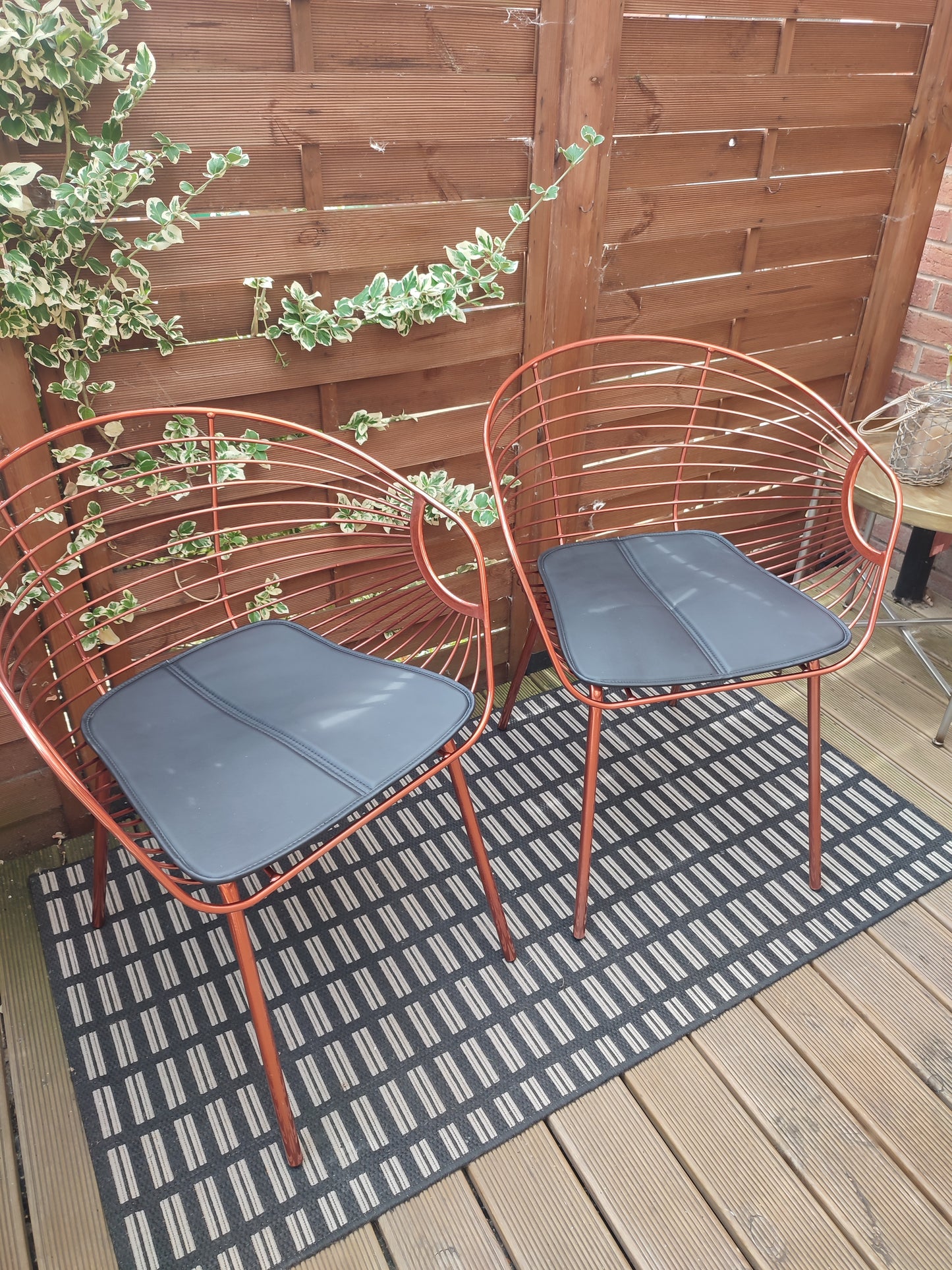 Two Rose Copper dining chairs