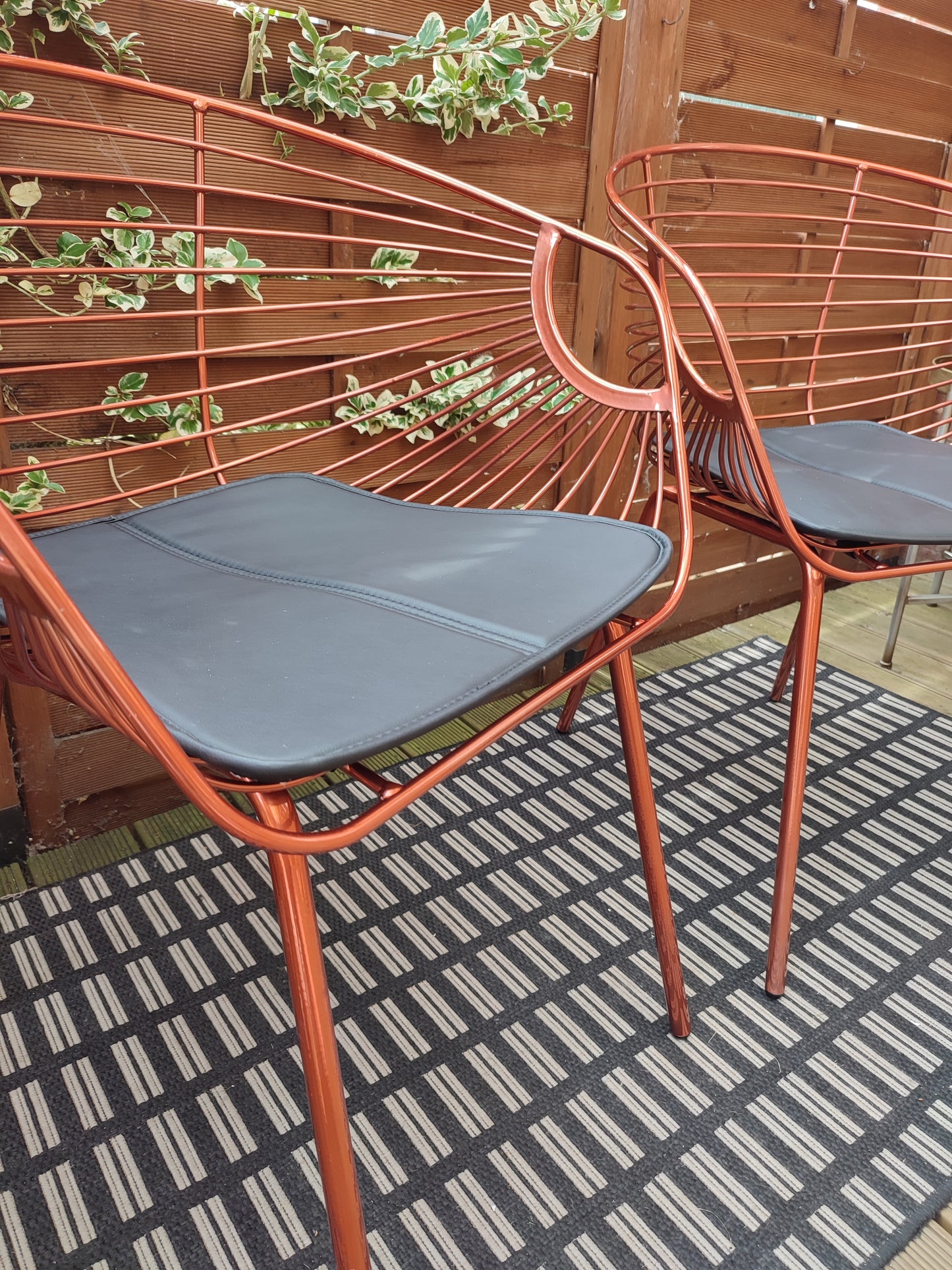 Two Rose Copper dining chairs