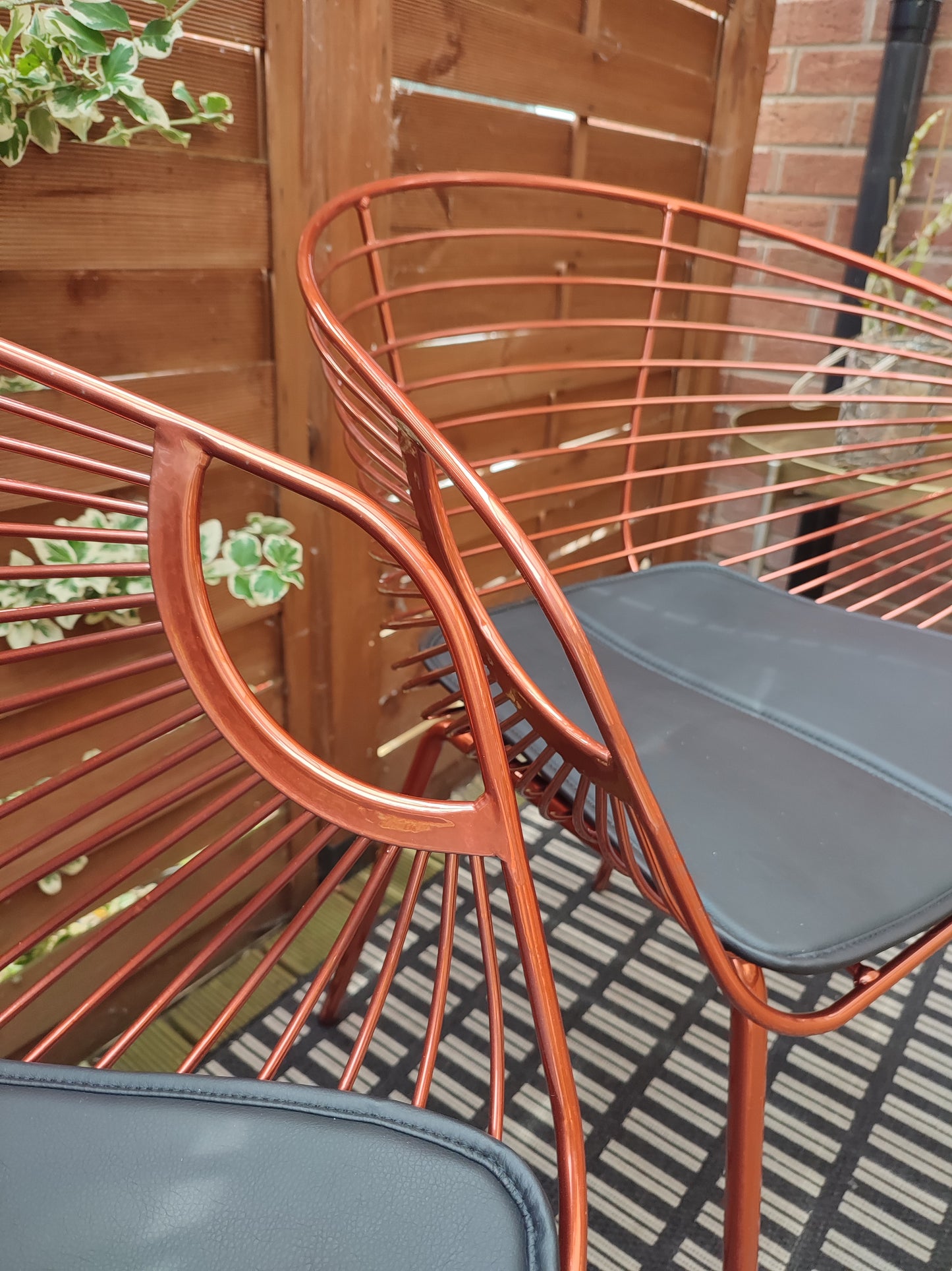Two Rose Copper dining chairs