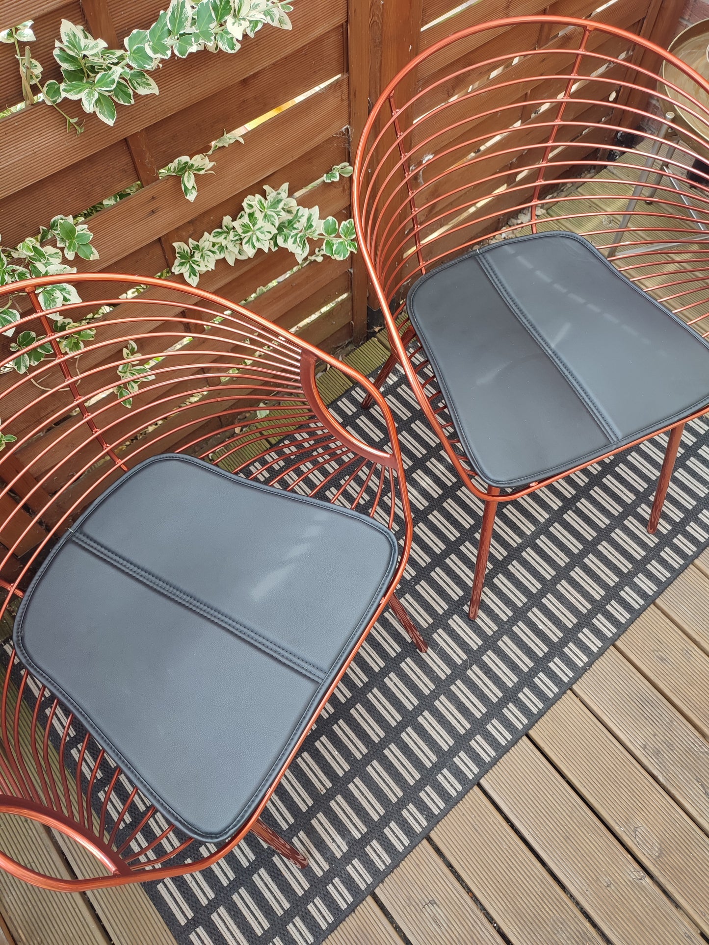 Two Rose Copper dining chairs