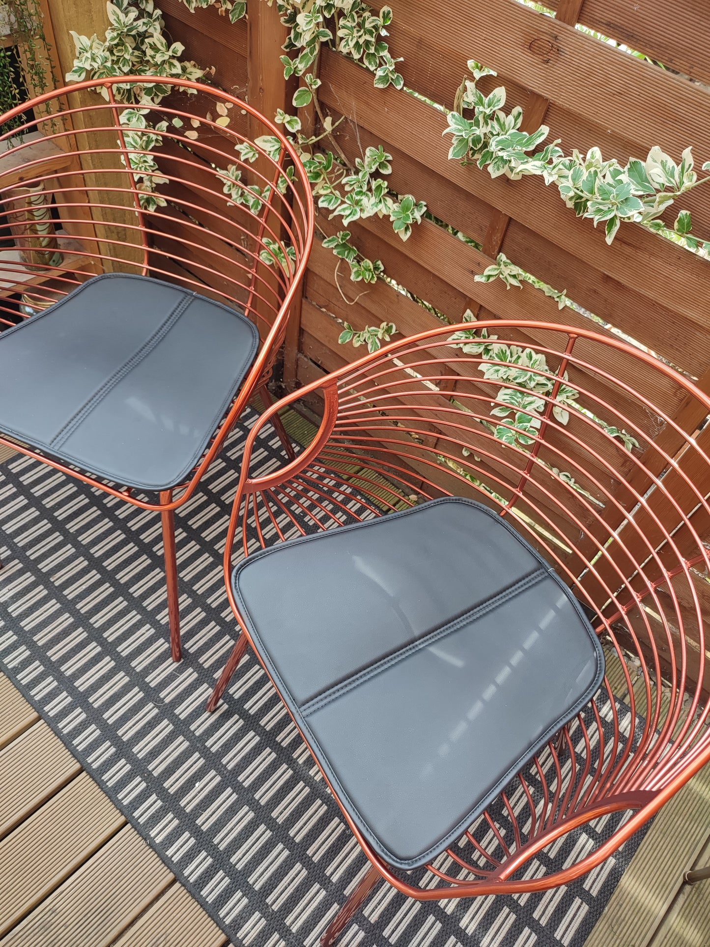 Two Rose Copper dining chairs