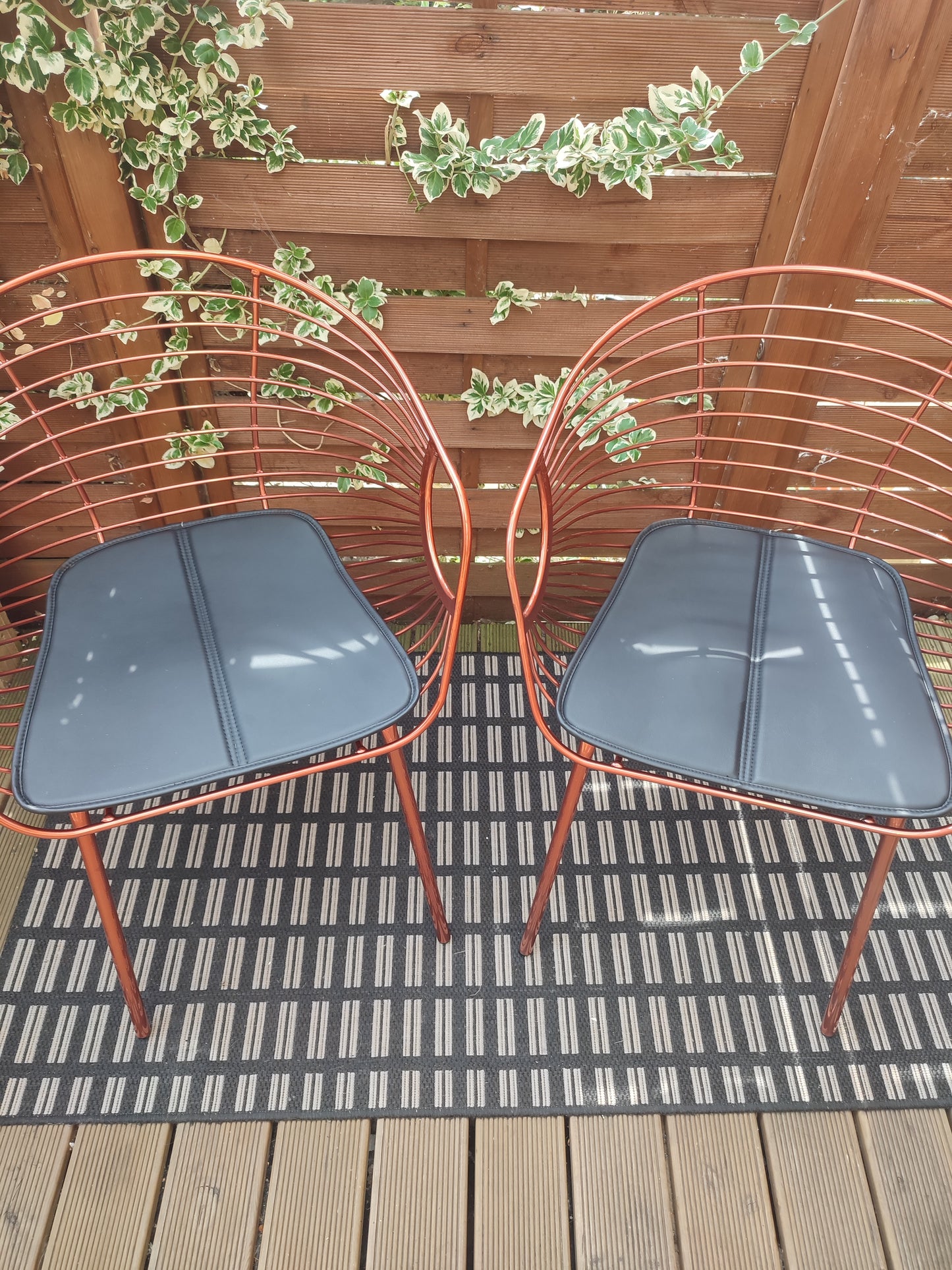 Two Rose Copper dining chairs