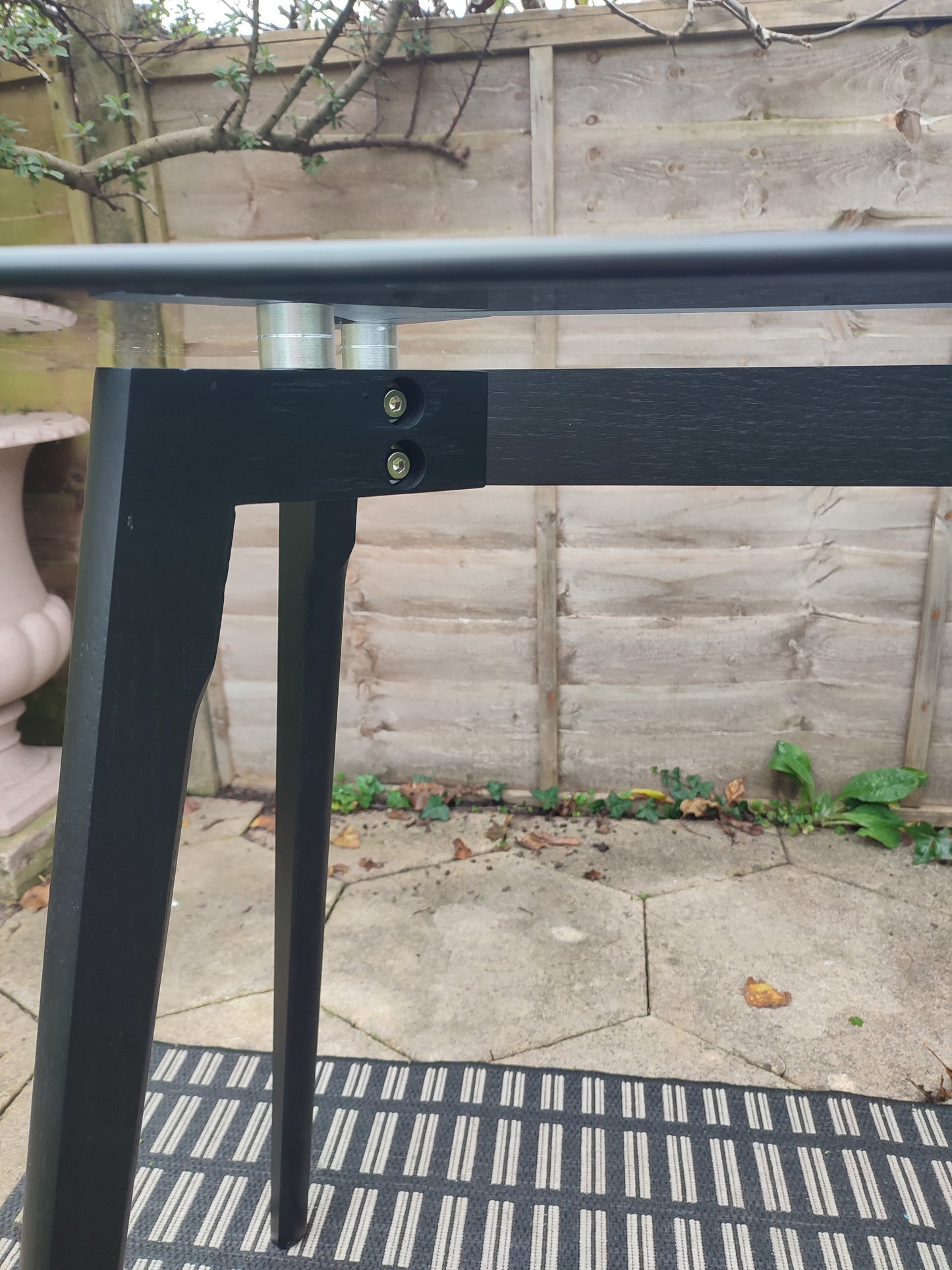 Console Table with Smoked Tempered Glass Top and Solid Oak Base in Black Finish