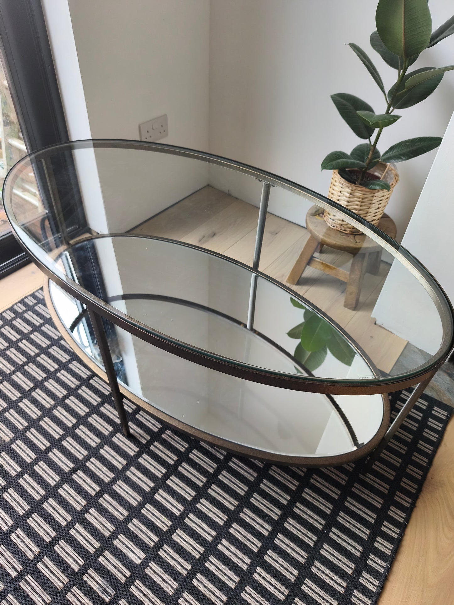 Oval Glass Coffee Table in bronze frame